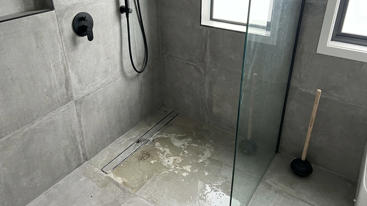Blocked-shower-drain-modern-bathroom